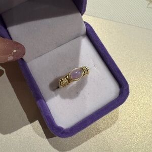 Kunzite stone on gold plated setting

Adjustable
